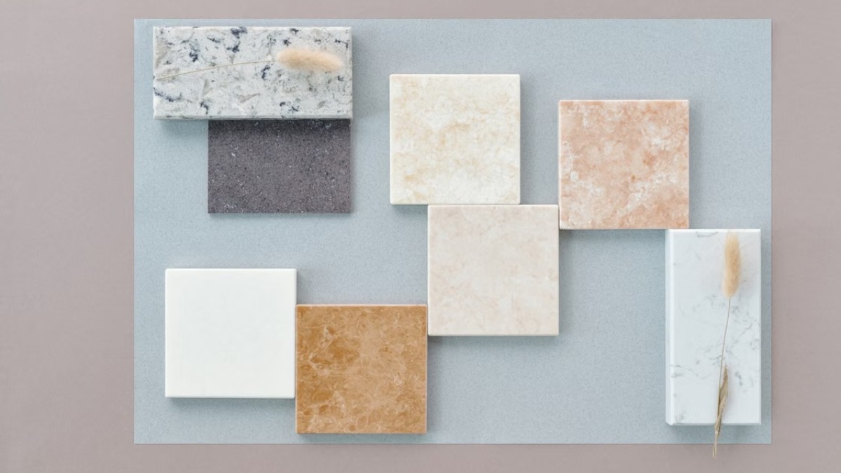 displaying various marble, stone, and tile material samples in neutral tones
